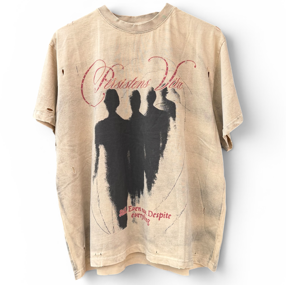 "STILL. EVEN NOW. DESPITE EVERYTHING" TEE
